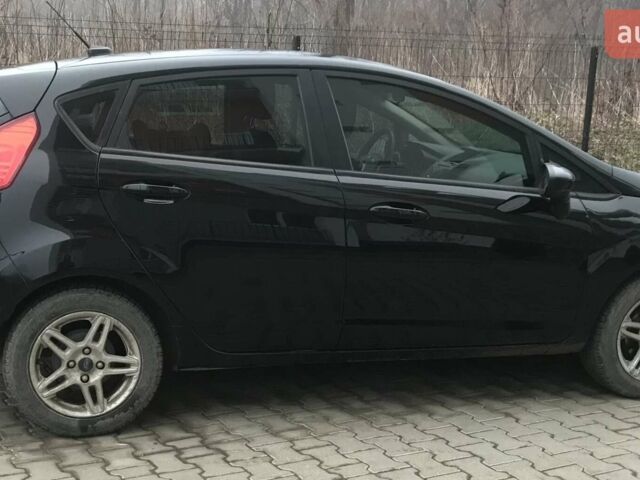 Черный Форд Фиеста, объемом двигателя 1.6 л и пробегом 131 тыс. км за 8600 $, фото 1 на Automoto.ua