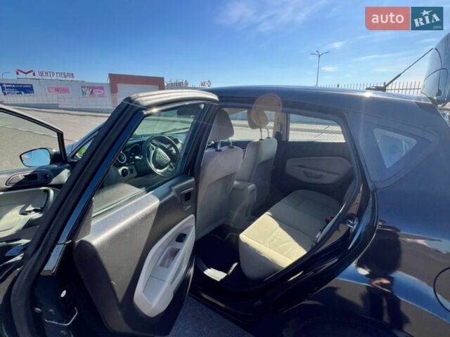 Черный Форд Фиеста, объемом двигателя 1.6 л и пробегом 170 тыс. км за 8000 $, фото 1 на Automoto.ua