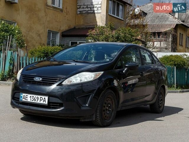 Черный Форд Фиеста, объемом двигателя 1.6 л и пробегом 170 тыс. км за 6300 $, фото 1 на Automoto.ua