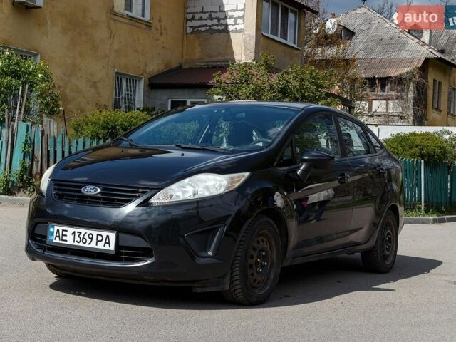 Черный Форд Фиеста, объемом двигателя 1.6 л и пробегом 170 тыс. км за 5500 $, фото 1 на Automoto.ua