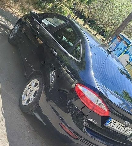 Черный Форд Фиеста, объемом двигателя 1.6 л и пробегом 165 тыс. км за 7500 $, фото 1 на Automoto.ua