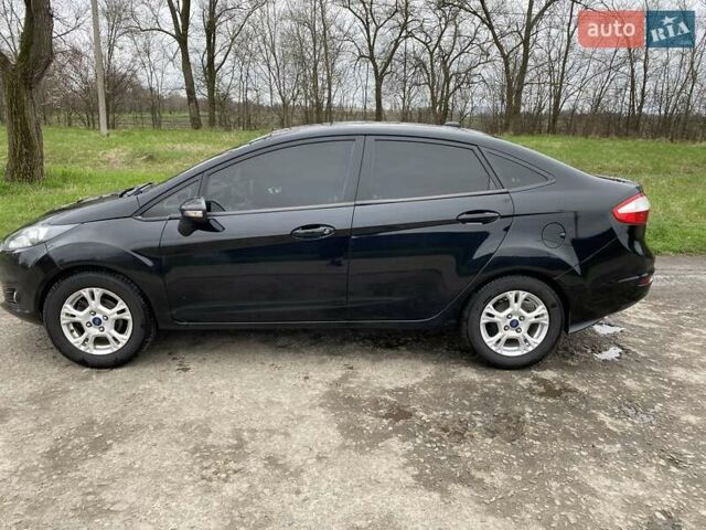 Чорний Форд Фієста, об'ємом двигуна 1.6 л та пробігом 230 тис. км за 7800 $, фото 1 на Automoto.ua