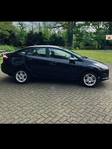 Черный Форд Фиеста, объемом двигателя 1.6 л и пробегом 115 тыс. км за 8700 $, фото 1 на Automoto.ua