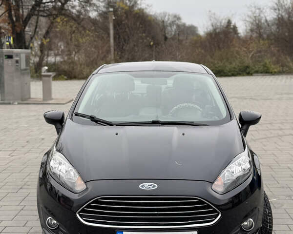 Черный Форд Фиеста, объемом двигателя 1.6 л и пробегом 77 тыс. км за 9500 $, фото 1 на Automoto.ua