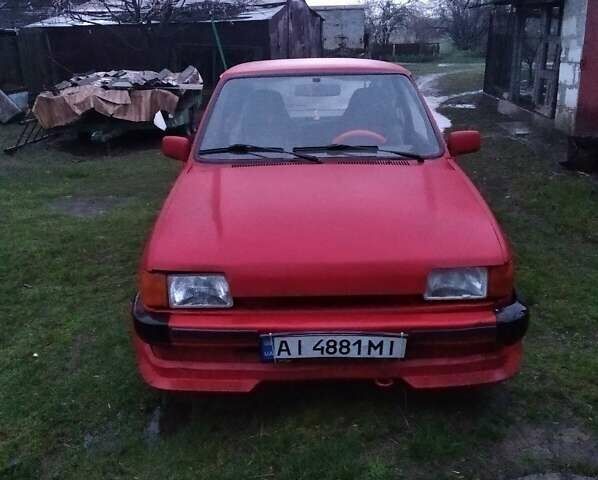 Красный Форд Фиеста, объемом двигателя 1.1 л и пробегом 100 тыс. км за 711 $, фото 1 на Automoto.ua