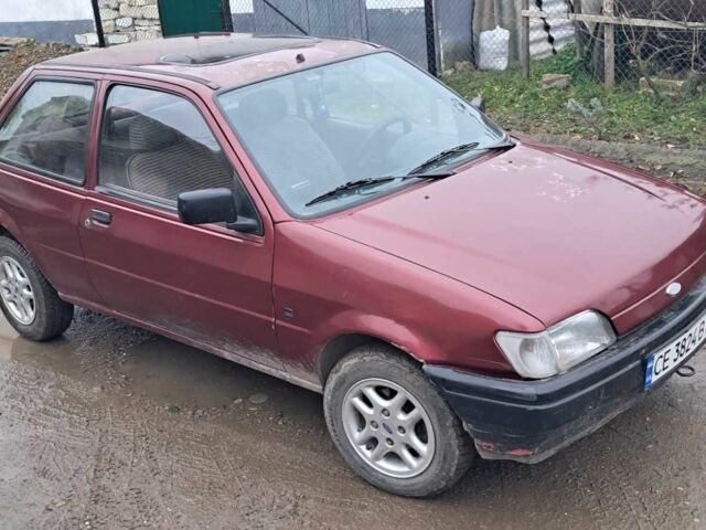 Красный Форд Фиеста, объемом двигателя 1.1 л и пробегом 100 тыс. км за 1070 $, фото 1 на Automoto.ua