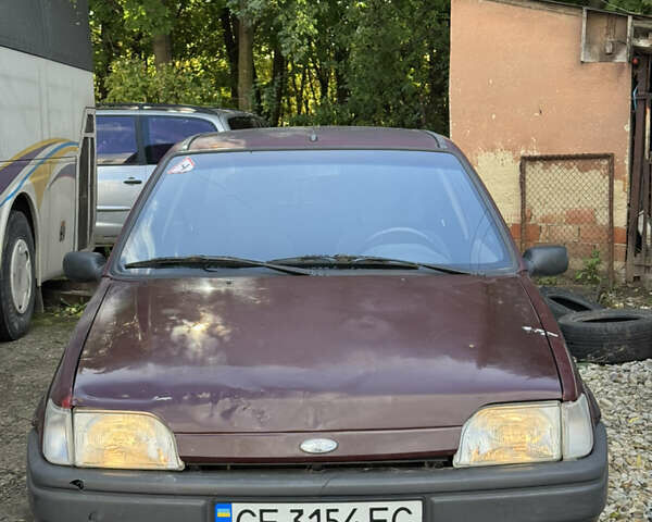 Червоний Форд Фієста, об'ємом двигуна 1.1 л та пробігом 380 тис. км за 1300 $, фото 1 на Automoto.ua