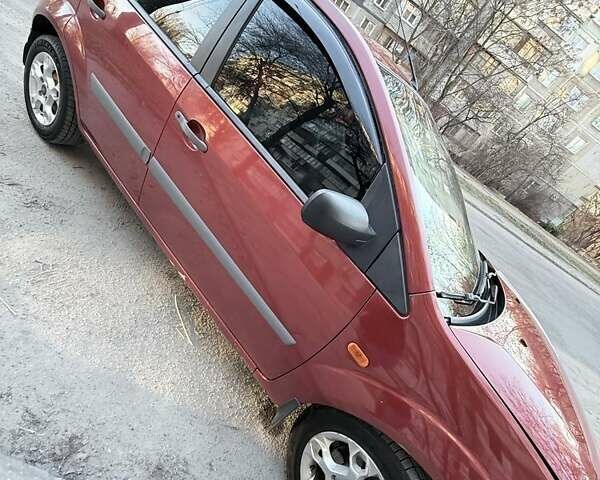 Красный Форд Фиеста, объемом двигателя 1.4 л и пробегом 330 тыс. км за 3700 $, фото 1 на Automoto.ua