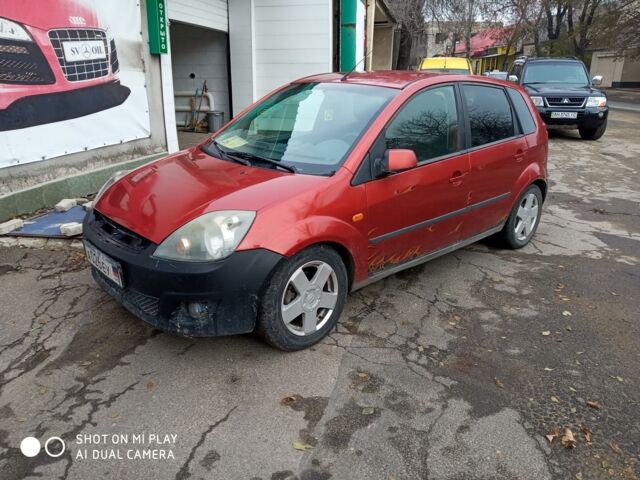 Красный Форд Фиеста, объемом двигателя 1.4 л и пробегом 260 тыс. км за 3300 $, фото 1 на Automoto.ua