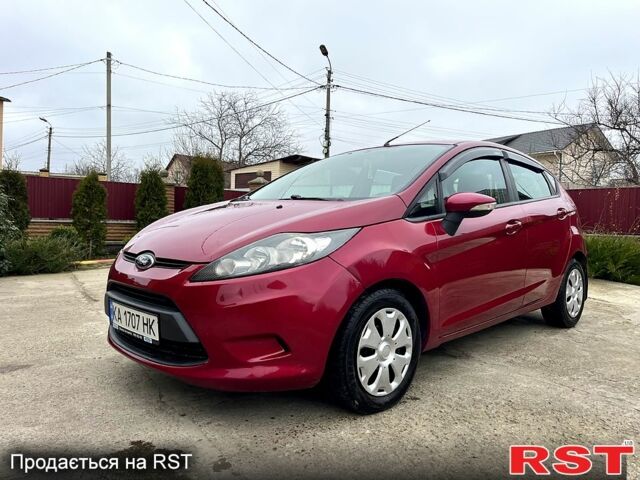 Красный Форд Фиеста, объемом двигателя 1.4 л и пробегом 136 тыс. км за 6350 $, фото 1 на Automoto.ua