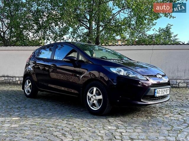Красный Форд Фиеста, объемом двигателя 1.24 л и пробегом 193 тыс. км за 6100 $, фото 1 на Automoto.ua