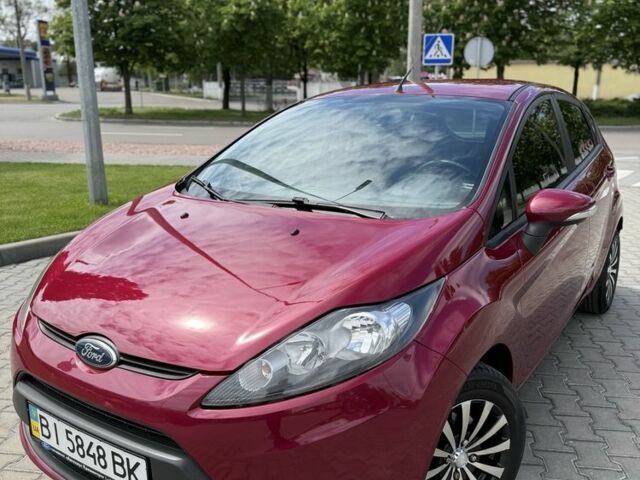 Красный Форд Фиеста, объемом двигателя 1.4 л и пробегом 115 тыс. км за 7600 $, фото 1 на Automoto.ua