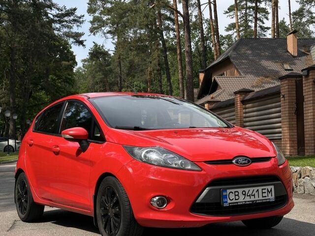Красный Форд Фиеста, объемом двигателя 1.4 л и пробегом 240 тыс. км за 6300 $, фото 1 на Automoto.ua