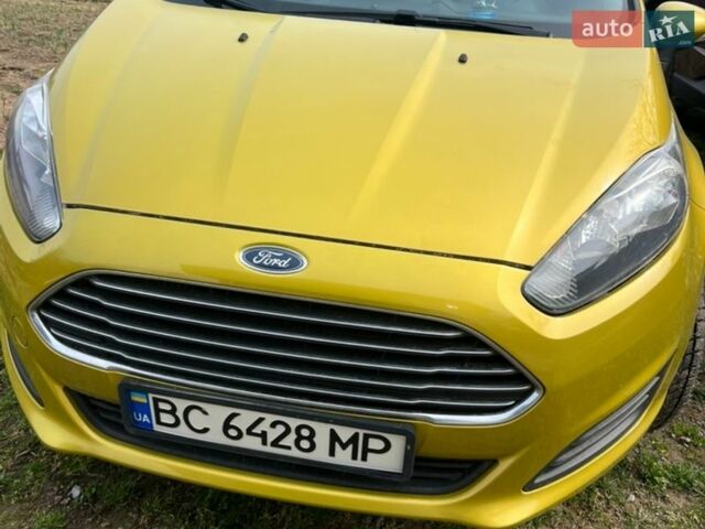 Желтый Форд Фиеста, объемом двигателя 1 л и пробегом 87 тыс. км за 5650 $, фото 1 на Automoto.ua