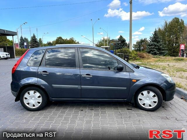 Серый Форд Фиеста, объемом двигателя 1.4 л и пробегом 1750 тыс. км за 3650 $, фото 1 на Automoto.ua