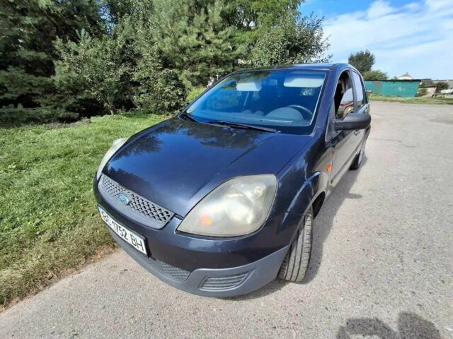 Серый Форд Фиеста, объемом двигателя 1.4 л и пробегом 204 тыс. км за 3799 $, фото 1 на Automoto.ua