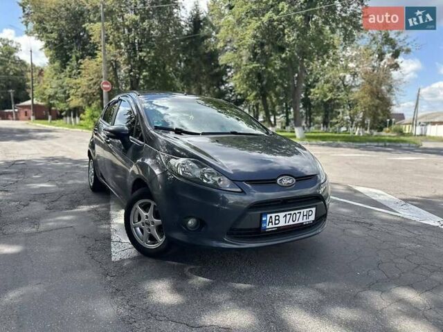 Серый Форд Фиеста, объемом двигателя 1.25 л и пробегом 97 тыс. км за 5499 $, фото 1 на Automoto.ua