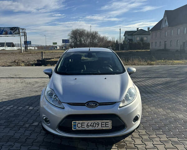 Серый Форд Фиеста, объемом двигателя 1.24 л и пробегом 184 тыс. км за 6483 $, фото 1 на Automoto.ua