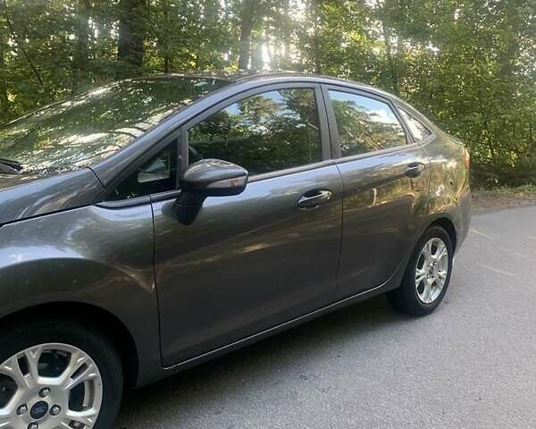 Серый Форд Фиеста, объемом двигателя 1.6 л и пробегом 100 тыс. км за 7000 $, фото 1 на Automoto.ua