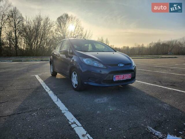 Синий Форд Фиеста, объемом двигателя 1.25 л и пробегом 187 тыс. км за 5590 $, фото 1 на Automoto.ua