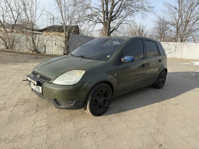 Зеленый Форд Фиеста, объемом двигателя 1.4 л и пробегом 331 тыс. км за 1500 $, фото 1 на Automoto.ua