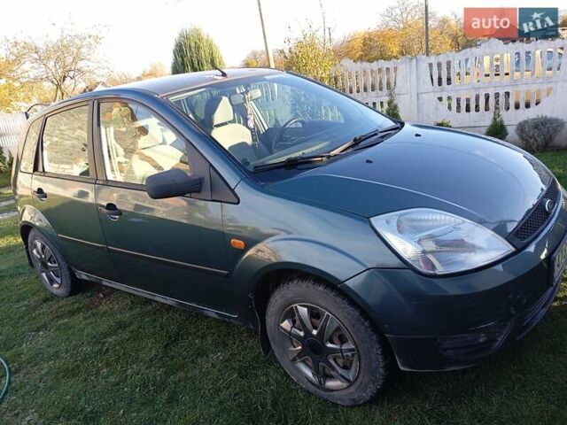 Зеленый Форд Фиеста, объемом двигателя 1.39 л и пробегом 221 тыс. км за 3300 $, фото 1 на Automoto.ua