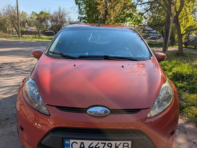 Помаранчевий Форд Фієста, об'ємом двигуна 1.24 л та пробігом 180 тис. км за 5000 $, фото 1 на Automoto.ua