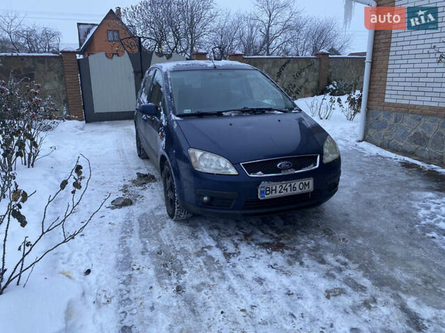 Синий Форд Focus C-Max, объемом двигателя 1.8 л и пробегом 209 тыс. км за 3800 $, фото 1 на Automoto.ua