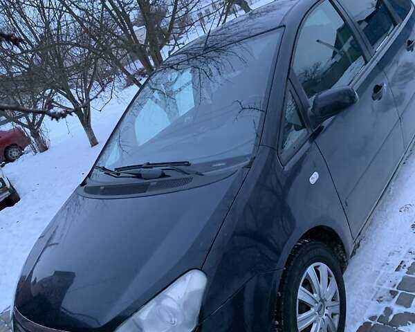 Синий Форд Focus C-Max, объемом двигателя 1.56 л и пробегом 290 тыс. км за 5100 $, фото 1 на Automoto.ua