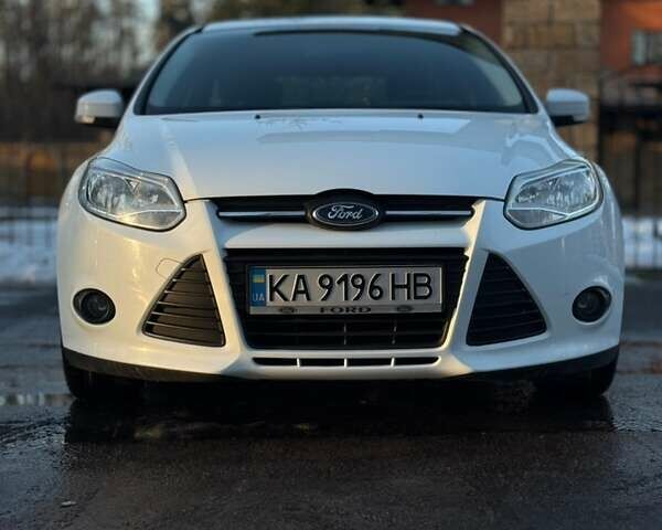 Белый Форд Фокус, объемом двигателя 1.56 л и пробегом 187 тыс. км за 6500 $, фото 1 на Automoto.ua