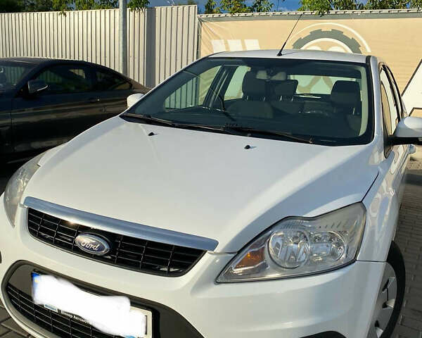 Белый Форд Фокус, объемом двигателя 1.4 л и пробегом 234 тыс. км за 6300 $, фото 1 на Automoto.ua