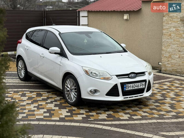 Білий Форд Фокус, об'ємом двигуна 2 л та пробігом 237 тис. км за 6900 $, фото 1 на Automoto.ua