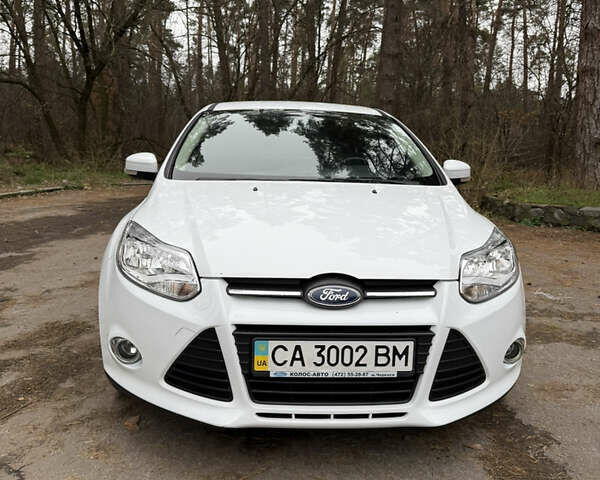 Белый Форд Фокус, объемом двигателя 1 л и пробегом 104 тыс. км за 7200 $, фото 1 на Automoto.ua
