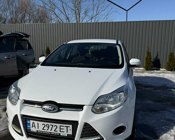 Білий Форд Фокус, об'ємом двигуна 1 л та пробігом 158 тис. км за 7100 $, фото 1 на Automoto.ua