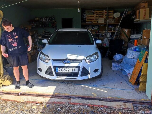 Білий Форд Фокус, об'ємом двигуна 1 л та пробігом 215 тис. км за 6000 $, фото 1 на Automoto.ua