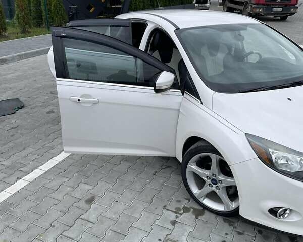 Форд Фокус 2014 в Золочев на Automoto.ua Белый Форд Фокус, объемом двигателя 2 л и пробегом 146 тыс. км за 8399 $, фото 1 на Automoto.ua