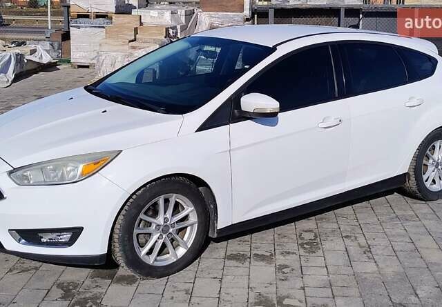 Белый Форд Фокус, объемом двигателя 2 л и пробегом 245 тыс. км за 6700 $, фото 1 на Automoto.ua