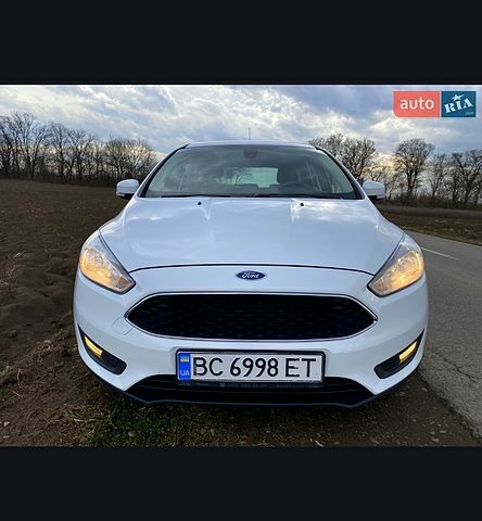 Белый Форд Фокус, объемом двигателя 1 л и пробегом 183 тыс. км за 6799 $, фото 1 на Automoto.ua
