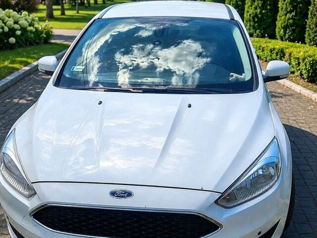 Белый Форд Фокус, объемом двигателя 1.5 л и пробегом 225 тыс. км за 8500 $, фото 1 на Automoto.ua