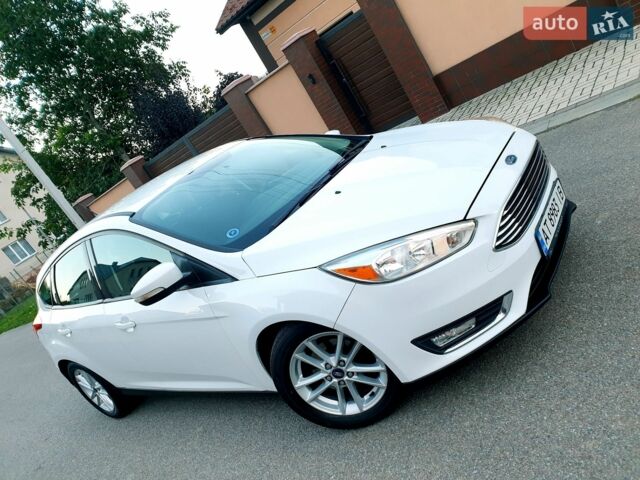 Білий Форд Фокус, об'ємом двигуна 2 л та пробігом 161 тис. км за 7469 $, фото 1 на Automoto.ua