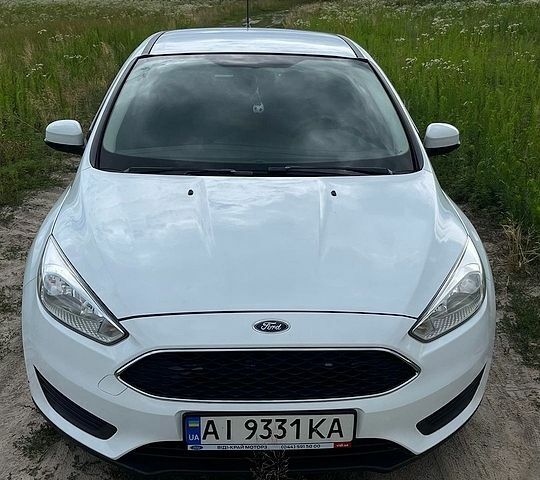 Белый Форд Фокус, объемом двигателя 1.6 л и пробегом 127 тыс. км за 13300 $, фото 1 на Automoto.ua