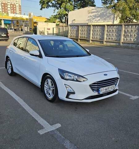 Белый Форд Фокус, объемом двигателя 1.5 л и пробегом 159 тыс. км за 14900 $, фото 1 на Automoto.ua