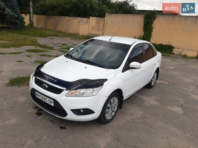 Белый Форд Фокус, объемом двигателя 1.6 л и пробегом 187 тыс. км за 5750 $, фото 1 на Automoto.ua