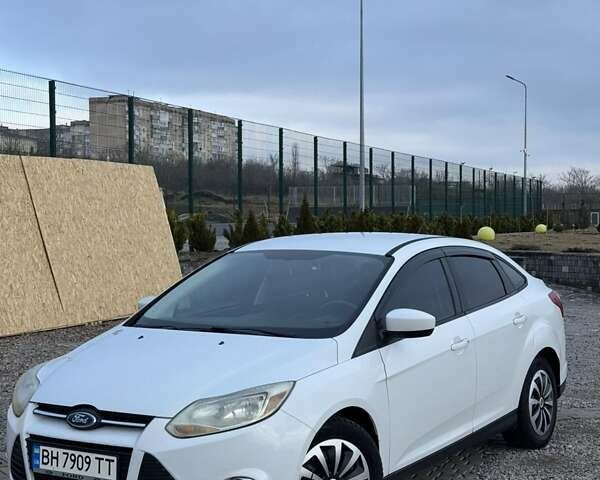 Белый Форд Фокус, объемом двигателя 2 л и пробегом 235 тыс. км за 5999 $, фото 1 на Automoto.ua