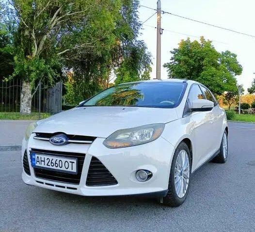 Белый Форд Фокус, объемом двигателя 2 л и пробегом 100 тыс. км за 7498 $, фото 1 на Automoto.ua