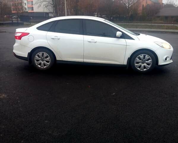 Белый Форд Фокус, объемом двигателя 1.6 л и пробегом 166 тыс. км за 7300 $, фото 1 на Automoto.ua