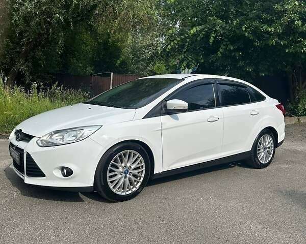 Білий Форд Фокус, об'ємом двигуна 2 л та пробігом 240 тис. км за 6100 $, фото 1 на Automoto.ua