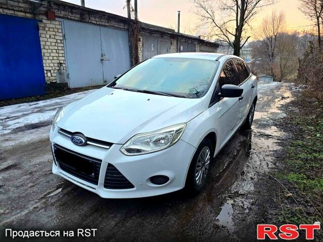 Білий Форд Фокус, об'ємом двигуна 2 л та пробігом 150 тис. км за 5990 $, фото 1 на Automoto.ua