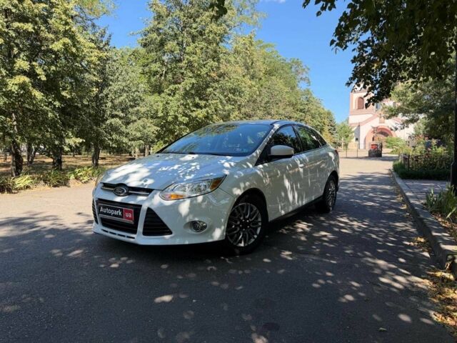 Білий Форд Фокус, об'ємом двигуна 2 л та пробігом 122 тис. км за 7001 $, фото 1 на Automoto.ua