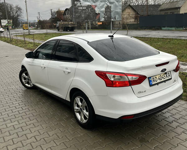 Білий Форд Фокус, об'ємом двигуна 2 л та пробігом 227 тис. км за 6950 $, фото 1 на Automoto.ua